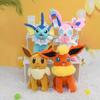 25cm Medium Eevee Plush Doll - 9 Designs with Tag: Fairy, Fire, Water, Ice, Sun, Sitting Open-Mouth