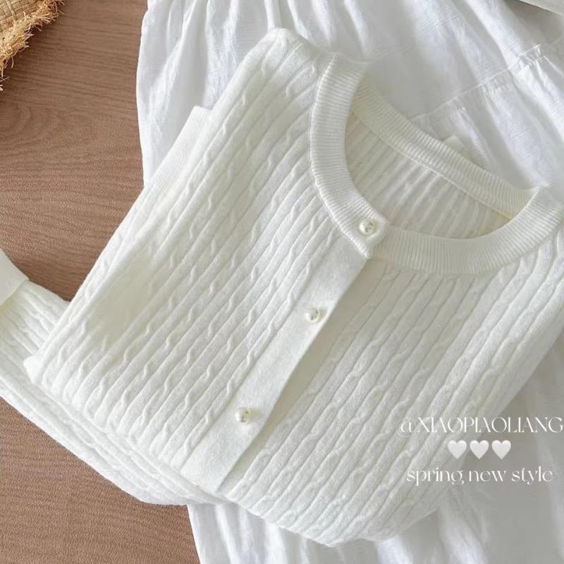 Autumn new age-reducing temperament round neck twist knitted cardigan women's loose and thin versatile sweater