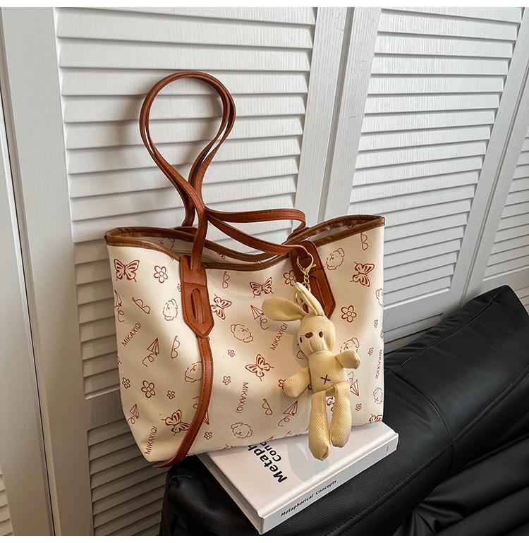 

Универсальные новые женские сумки высокого класса весна 2025, для студенток на занятия, сумки-тоут большой вместимости, сумки через плечо, для поездок на работу Without pendant коричневый