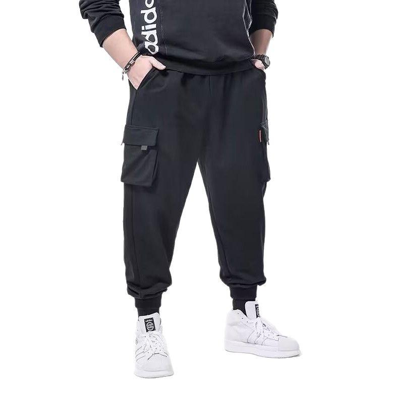 Pánské letní sportovní kalhoty volného střihu ve větších velikostech - Módní ležérní zeštíhlující střih