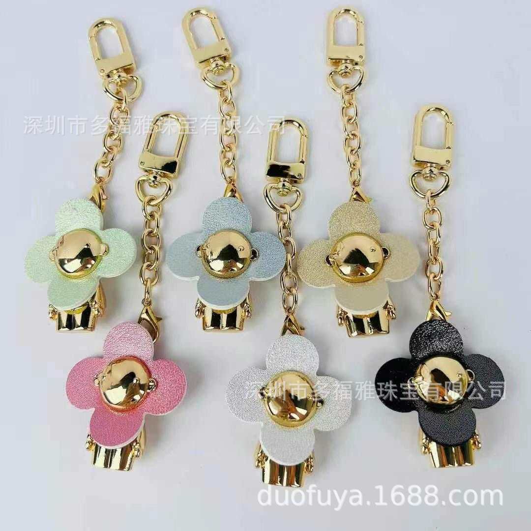

Trendy High-Quality Textured Phone Case with Colorful Metal Keychain Pendant No Box