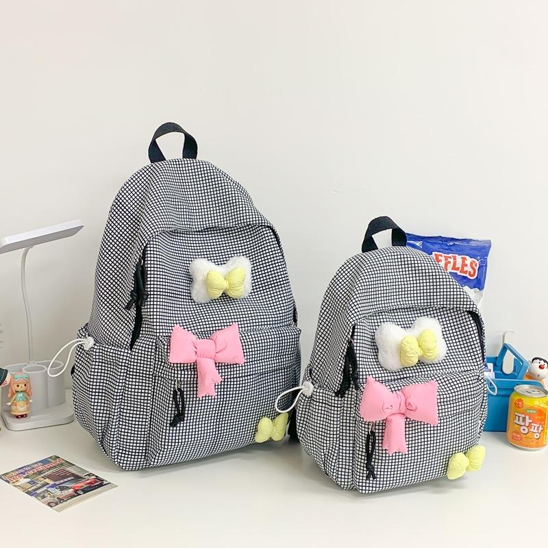 School Bag Autumn New Small Fresh Plaid Primary School Bag Junior High School Cute Girl Contrasting Colors To Reduce the Burden Travel Backpack