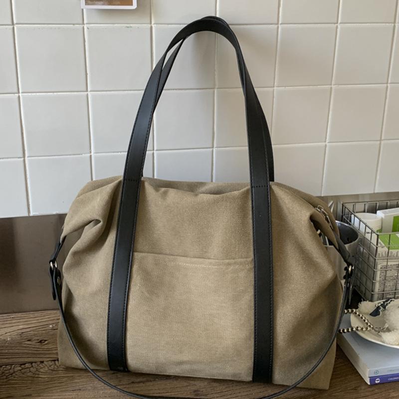 Lazy portable large-capacity canvas bag 2025 new tote bag niche casual retro commuter shoulder big bag women