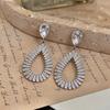 Silver Needle Zirconia Water Drop Earrings: European & American Style, Light Luxury Design for Women.