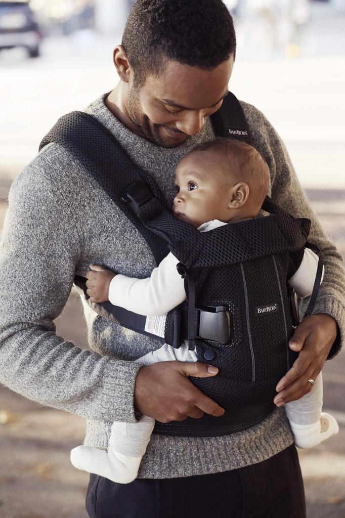 BabyBjörn ONE KAI Air Baby Carrier, suitable for babies 0-36 months, made with breathable mesh material, black, 4-way design.