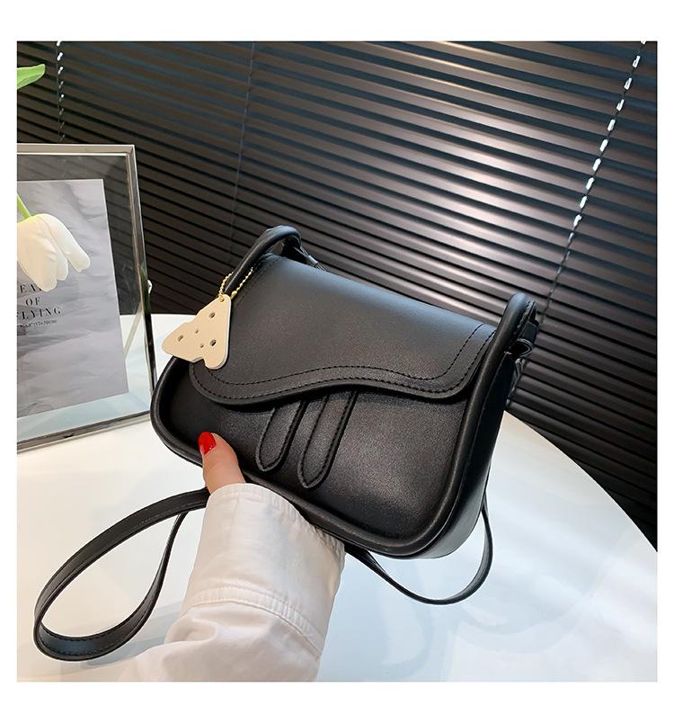 

Цього року популярна мода та простий темперамент, маленька квадратна сумка, весняна нова текстурна сумка через плече, модна жіноча сумка чорний