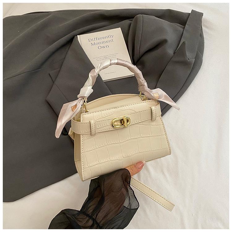 

Hand carrying high-end textured bag women s 2025 summer new commuting versatile shoulder bag Korean version fashion women s bag бежевый