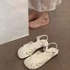 Mori baotou sandals female 2025 summer new fairy wind woven Roman shoes hollow flat bottom pig cage beach shoes