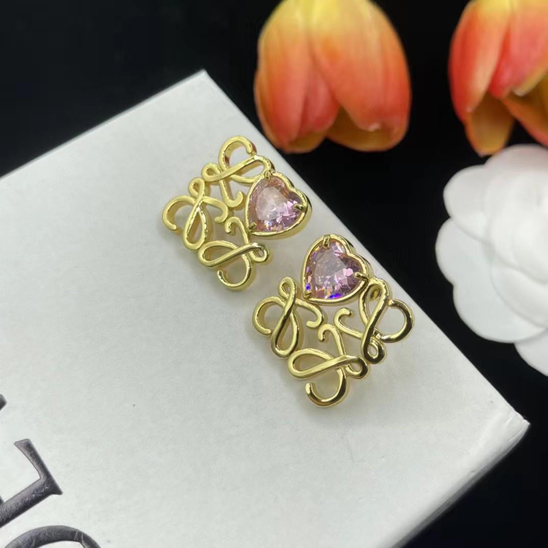 

Luo Jia Luxe Heart Zircon Stud Earrings with Hollow Metal Design