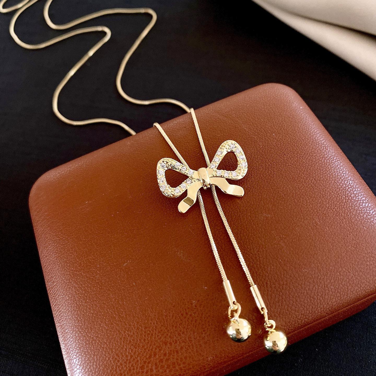 Korean ins zircon bow fringed necklace accessories women s exquisite sweater chain light luxury necklace