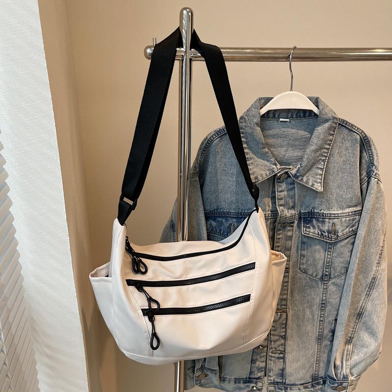 

Студенты ездят на занятия Сумка-мессенджер большой вместимости Женская повседневная модная сумка через плечо 2025 Новая простая и свежая тканевая сумка