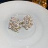 French pearl oval shell earrings white flower high-end stud earrings fashion temperament light luxury earrings women