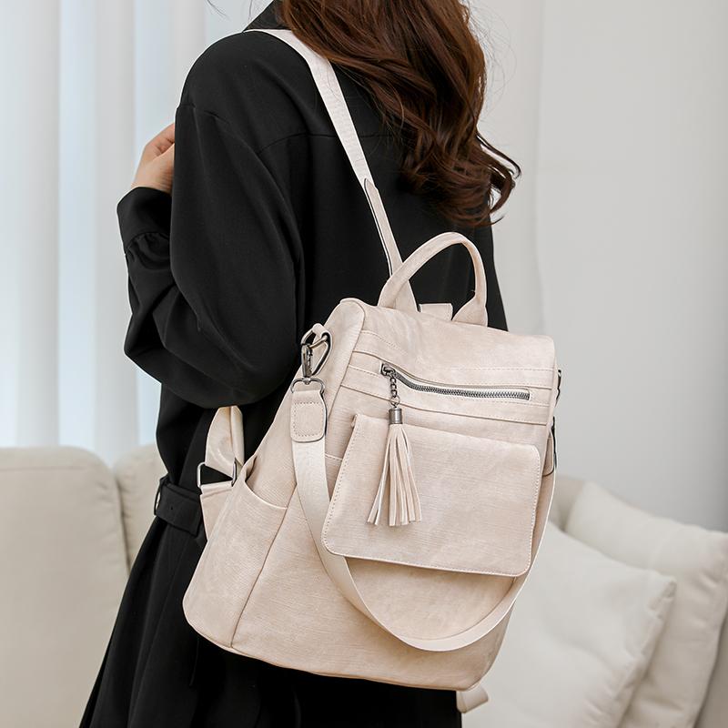 Women's Soft Leather Backpack Large Capacity Student Commuter Schoolbag Tassel Travel Backpack