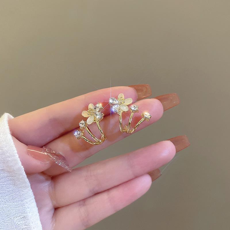 

Copper-Plated Gold Flower Stud Earrings with Green Cat s Eye Stone and Zirconia on S925 Silver Needle