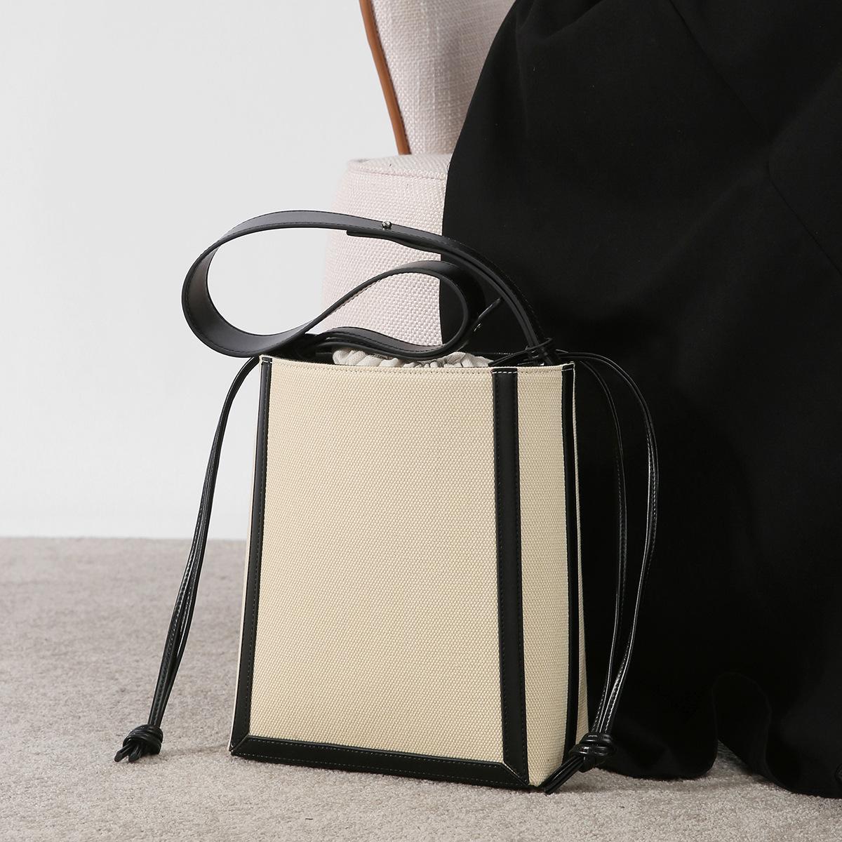 Large-capacity canvas drawstring bucket bag for women, commuter bag, 2024 new model, high-end shoulder bag, vintage crossbody bag