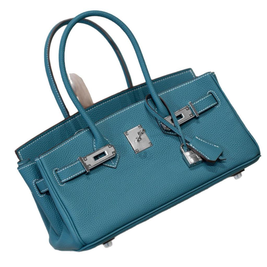 Neue lange Tragetasche Verschluss Silberschnalle Oberleder Rindsleder Mode Ein-Schulter-Handtasche Schloss Schnalle Leder Damen Tasche Handtasche