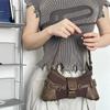 Retro Patchwork Achselhöhen-High-End-Motorrad Hot Girl High Looks Vielseitige Einzel-Schulter-Baguette-Tasche