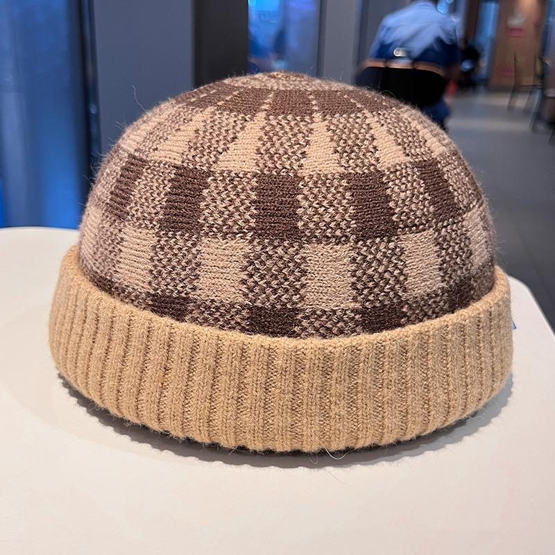 Europa und die Vereinigten Staaten heiß verkaufendes Karomuster Herbst und Winter Wollmütze Damen Krempe warm winddicht Strickmütze einfache Hauptmütze