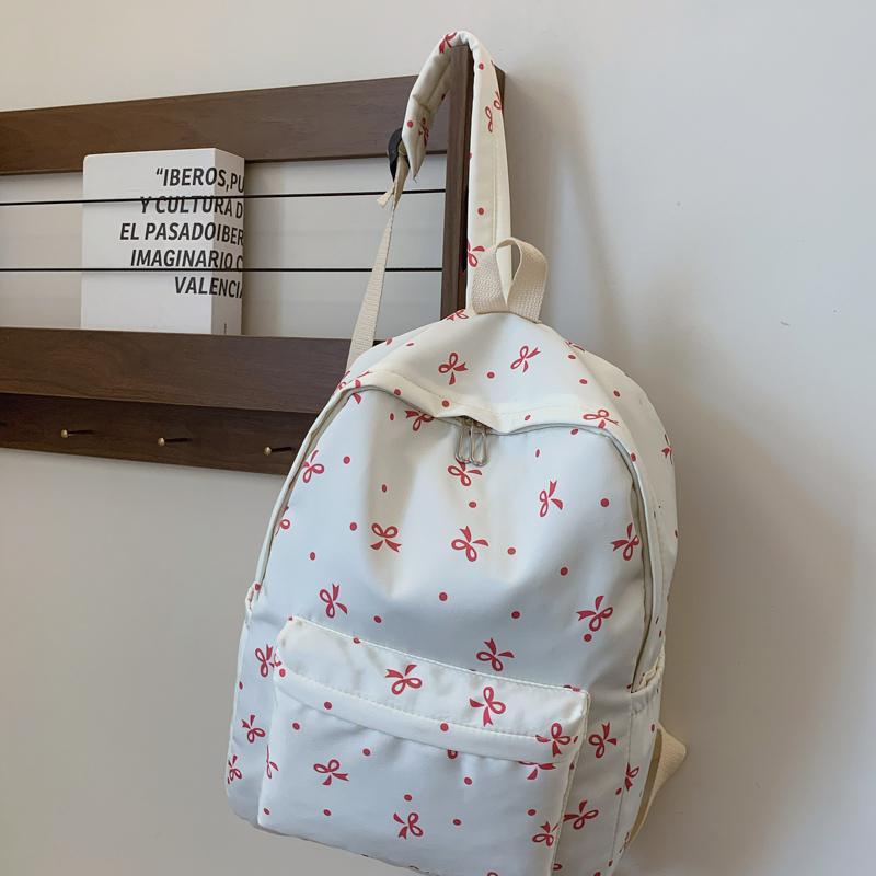 Back To School Backpack Playful Bow Print Bookbag Quilted Comfort and Multi-Pocket Organization System for Women's Campus Life
