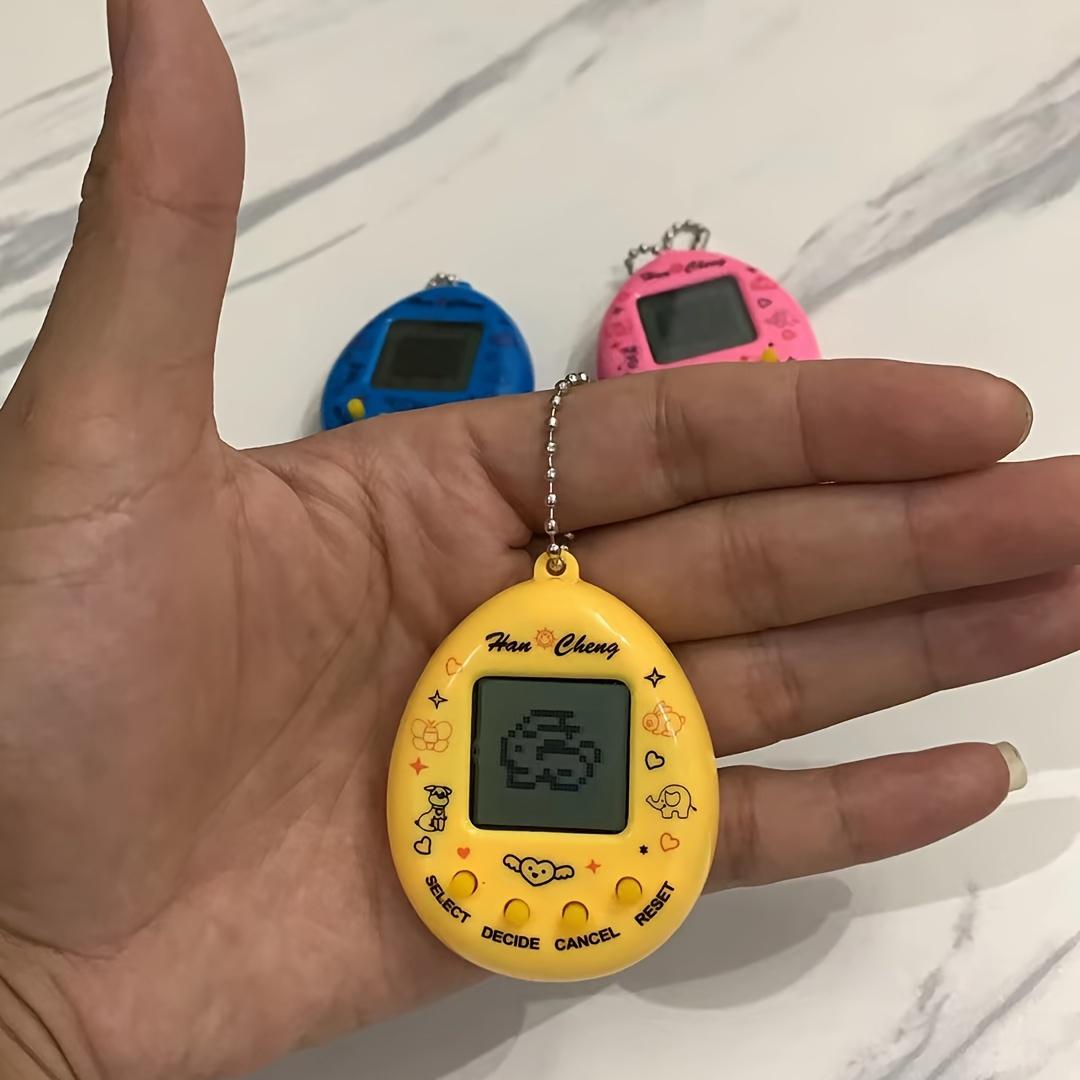 

Retro Mini Handheld Gaming Console with Virtual Pet Keychain – Battery-Powered, Creative Gameplay, Available in Pink/Blue/Yellow, Xcnm for Winter жовтий
