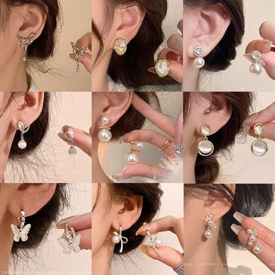 Korean Tassel Earrings: Silver Needle, High-End Imitation Pearl, Retro Cat's Eye Stone – Niche Style for Women