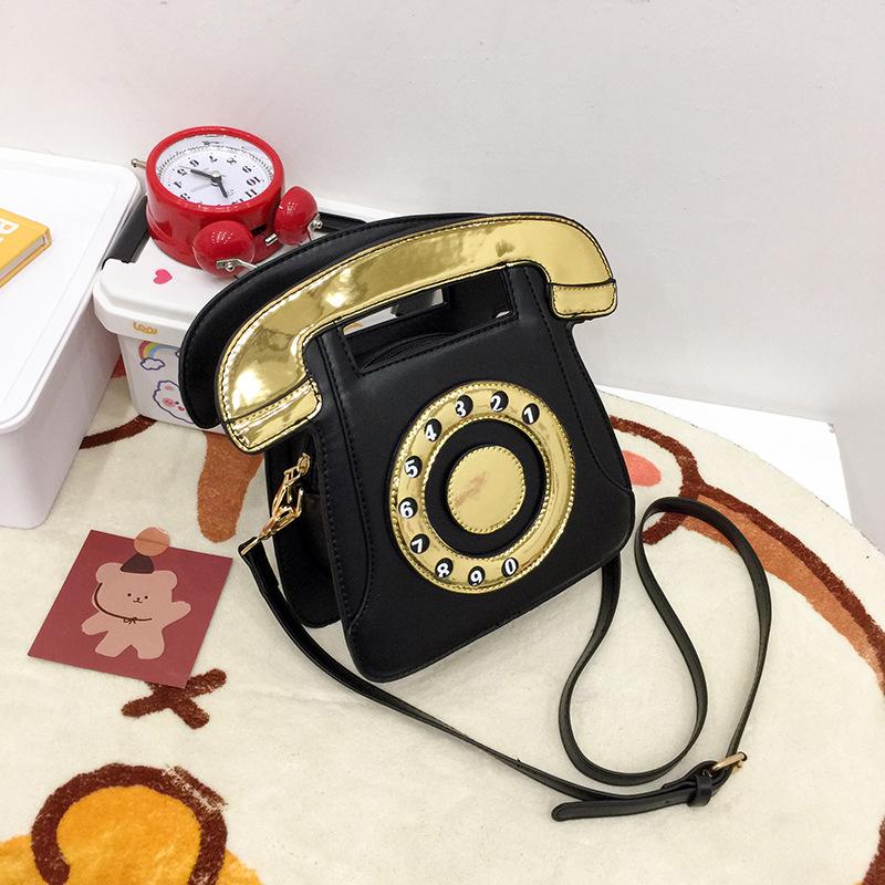 

Foreign trade girl personality simulation phone small bag Europe, America 2025 Japanese cute cartoon shoulder handbag рожевий