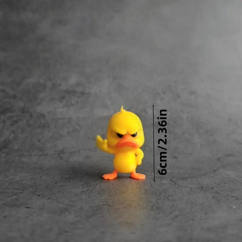 

Angry Yellow Duck Statue with Rejecting Gesture. Funny Mini Figurine for Desk, Car, Home Decor. A Playful & Lightweight Gift.