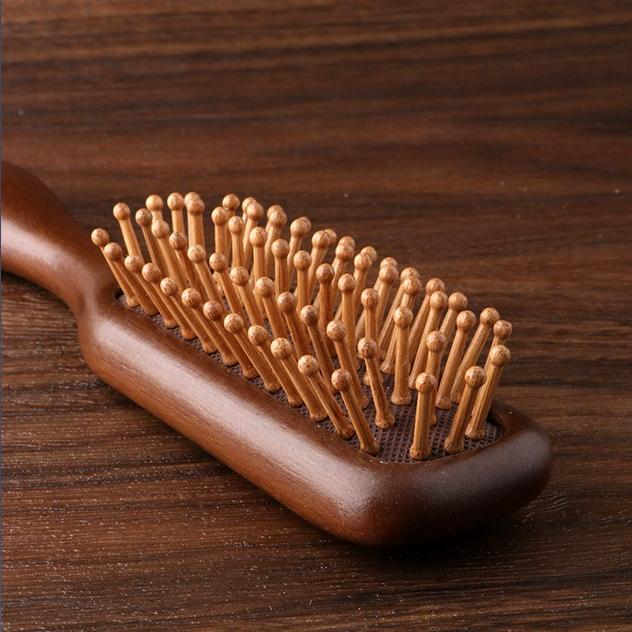 Narrow air cushion comb Massage comb head sandalwood solid wood comb Portable hair brush Household