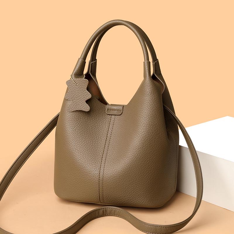 2025 High-End Genuine Leather Women's Shopping Basket Bag with Double-Sided Texture and Leather Tag.