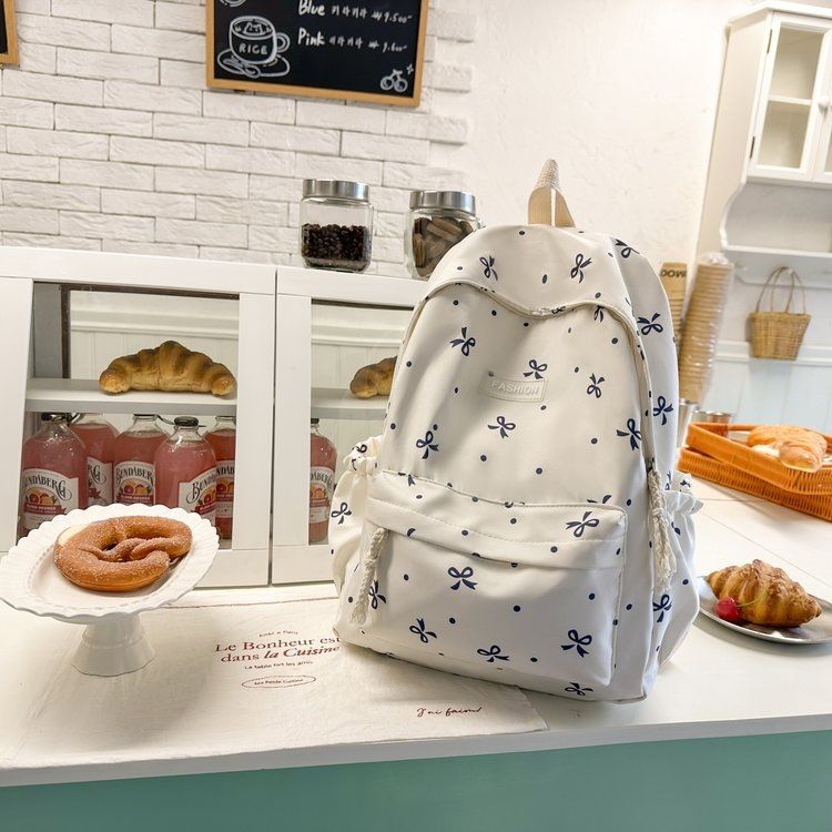 Schoolbag bow backpack girl fresh floral college student junior high school backpack large capacity schoolbag ins
