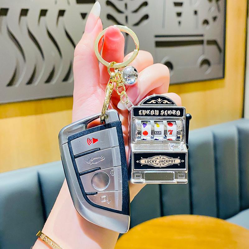 Delightful Gold And Silver Fruit Machine Keychain Thoughtful Gift For Any Occasion