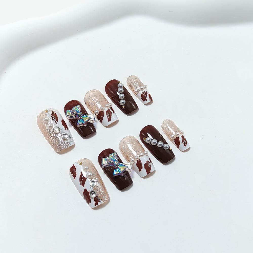 Cow Print Pearl Bow Nail Art Tips in Elegant Brown Tones Small