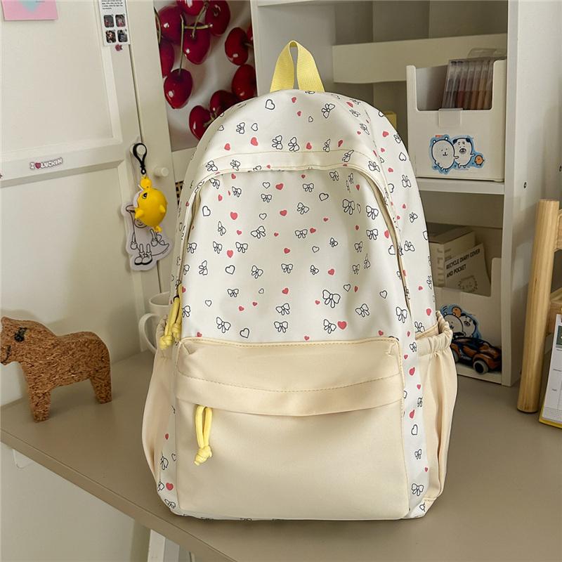 Cute Heart and Bow Print School Backpack with Front Pocket Top Handle Casual Daypack for Girls Students