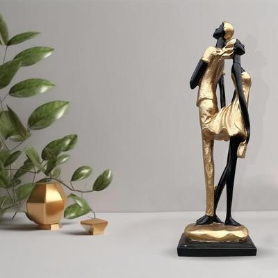 Stylish Golden Black Resin Romantic Couple Statue for Home Decor (Pack of 1, Black & Golden)