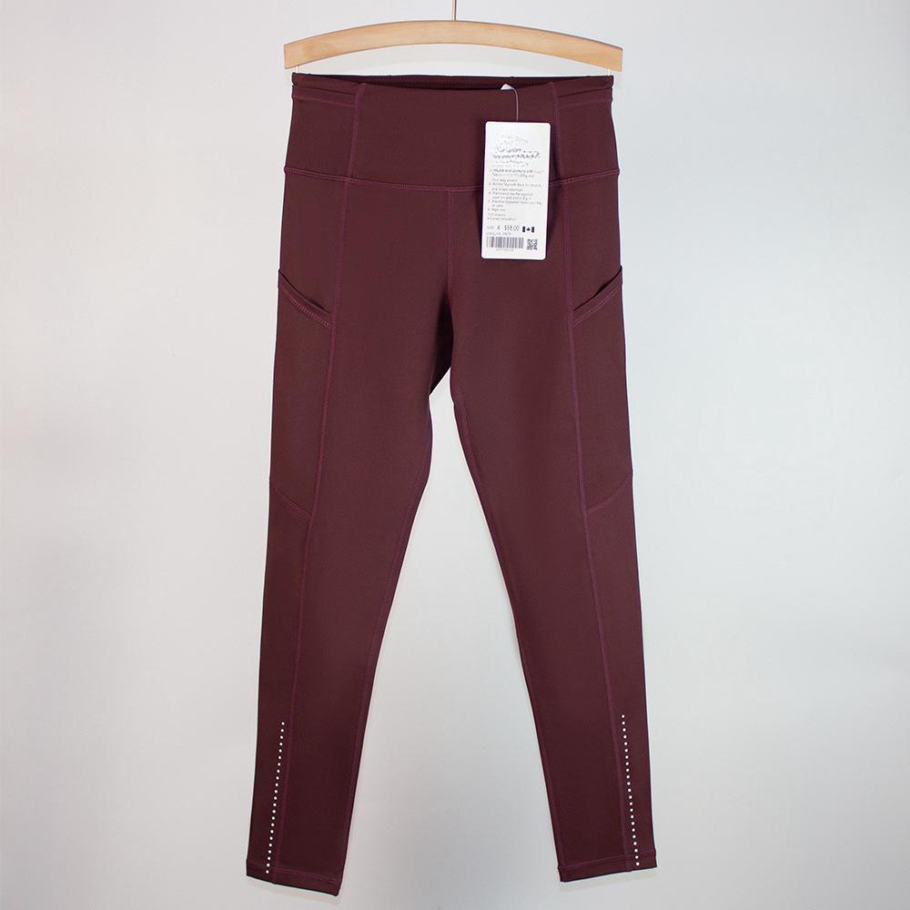 Women's High Waist Tummy Control Yoga Pants with Pockets - Tight Fit for Running, Cycling, and Outdoor Activities.