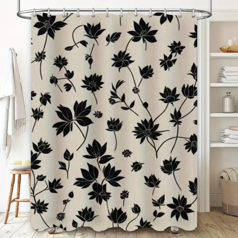 Decorate your bathroom with this elegant black floral shower curtain featuring a modern design and durable fabric for long-lasti