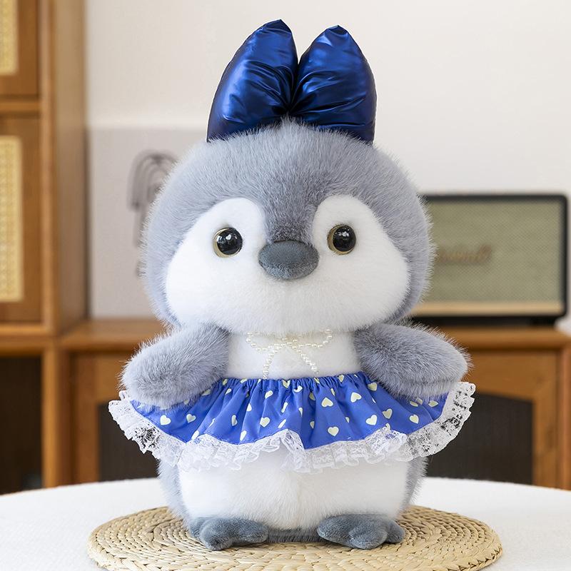 

New Cute Bow Skirt Penguin Plush Toy Doll Aquarium Souvenir Children s Birthday Gift 27cm (0.15kg without pearl decoration)