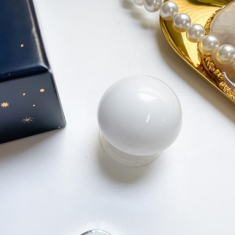 

Red Nose Crystal Ball Solid Color Mobile Phone Airbag Bracket Desktop Lazy Air Cushion Support Frame Niche Creative Retractable