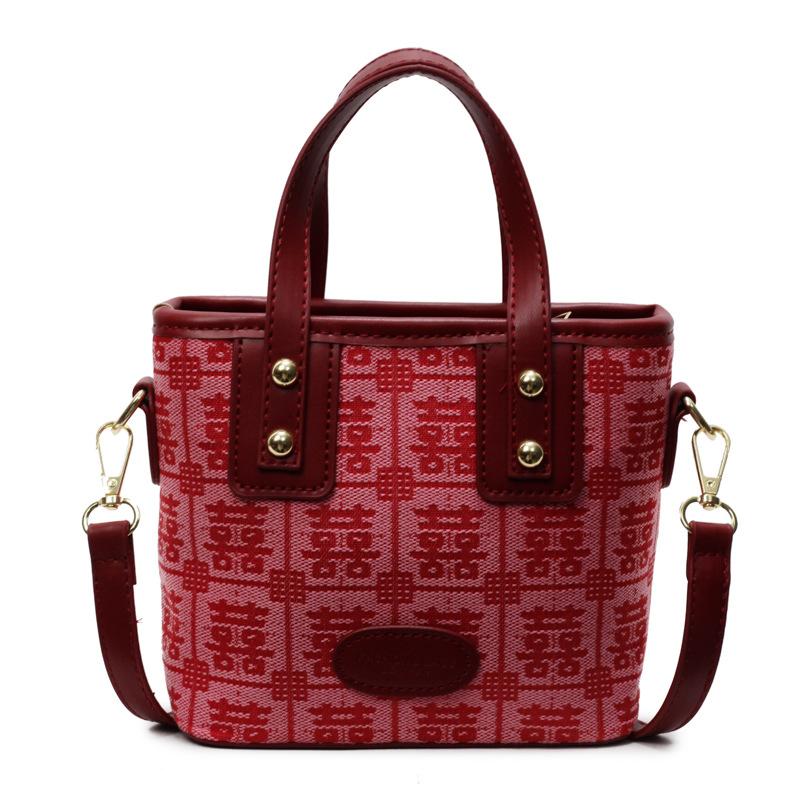 Bag women's spring and summer new contrasting color bucket bag casual red handbag embroidered women's bag wedding bag