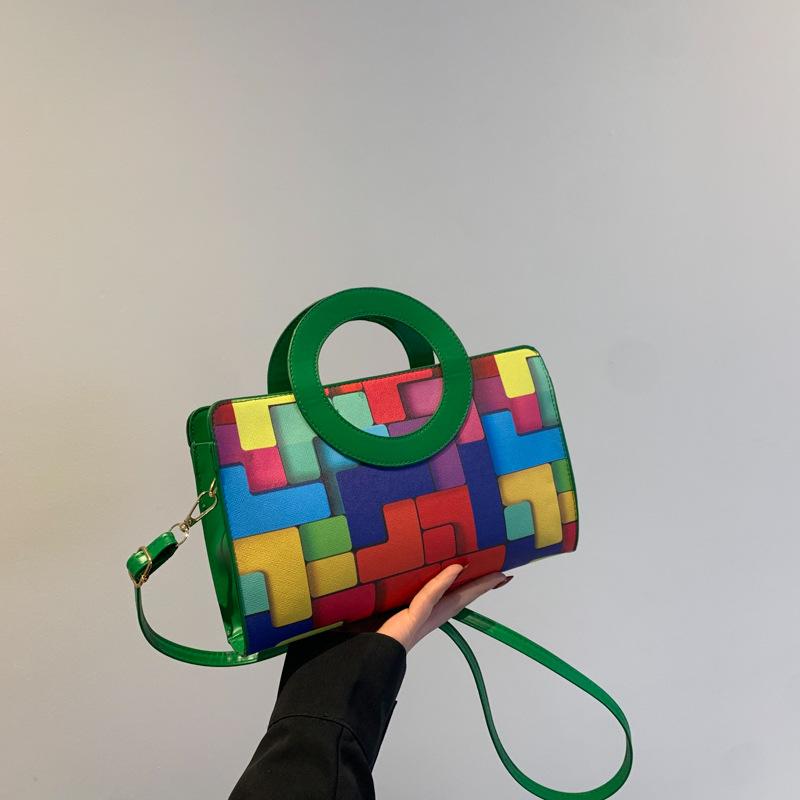 

Contrasting color fashion handbag 2025 spring and summer new foreign style niche design versatile shoulder messenger bag зелёный