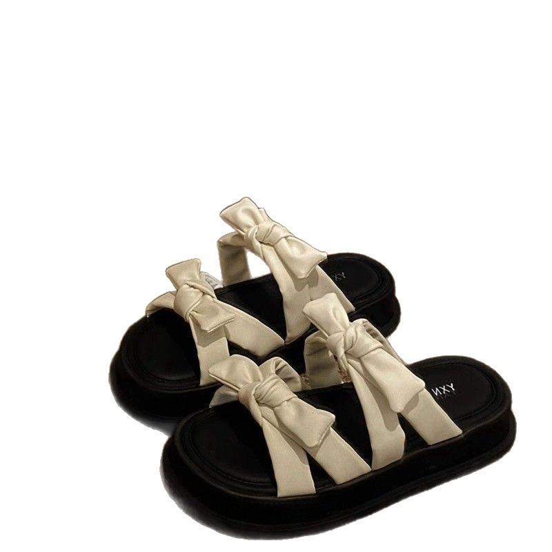 Thick-soled one-word slippers for women to wear summer new bows with skirts fashionable beach sandals
