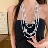 Irregular pearl multi-layer necklace, retro exaggerated personality collarbone chain, light luxury, high-end sense necklace, women