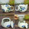 Waza no Kura: Stylish Kutani ware teapot with camellia design and tea strainer. Made in Japan. A premium ceramic brand. A great birthday gift.