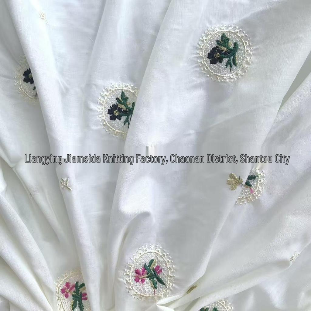 Light Apricot Cotton Fabric with Small Embroidered Flowers - Fresh Style for Women's Clothing and Children's Bags.