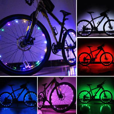 Bicicletta Bici Ciclismo Raggio Filo Pneumatico Ruota di Sicurezza Valvola Luce LED Lampada Colorata