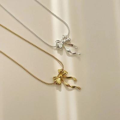 Náhrdelník s mašlí a střapcem pro ženy Lehký luxusní Niche design Personalizovaný zvířecí přívěsek Řetízek na klíční kost