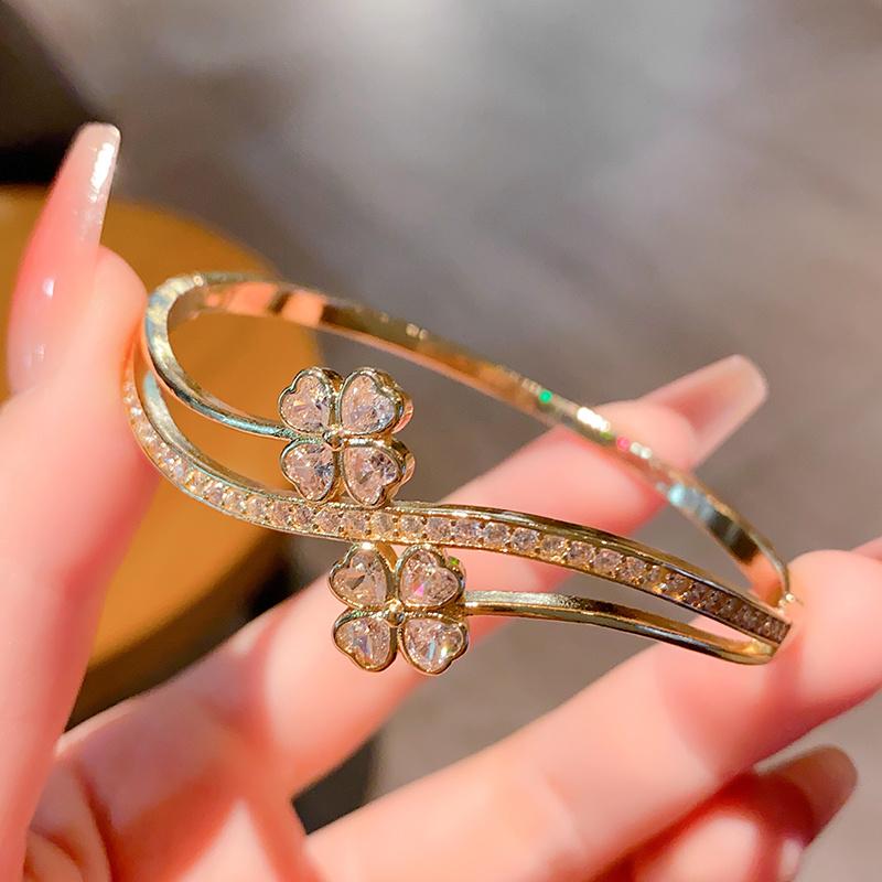 New double-strap four-leaf clover zircon open bracelet, gold and silver two-tone zircon design, light luxury bracelet, niche fashion double-layer