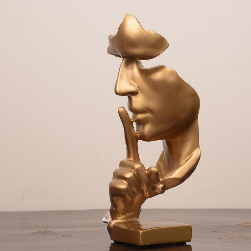 

Тишина - это абстрактная скульптура, фигурные орнаменты, современная роскошь и креативное украшение на рабочем столе офиса украшения золотого винного шкафа