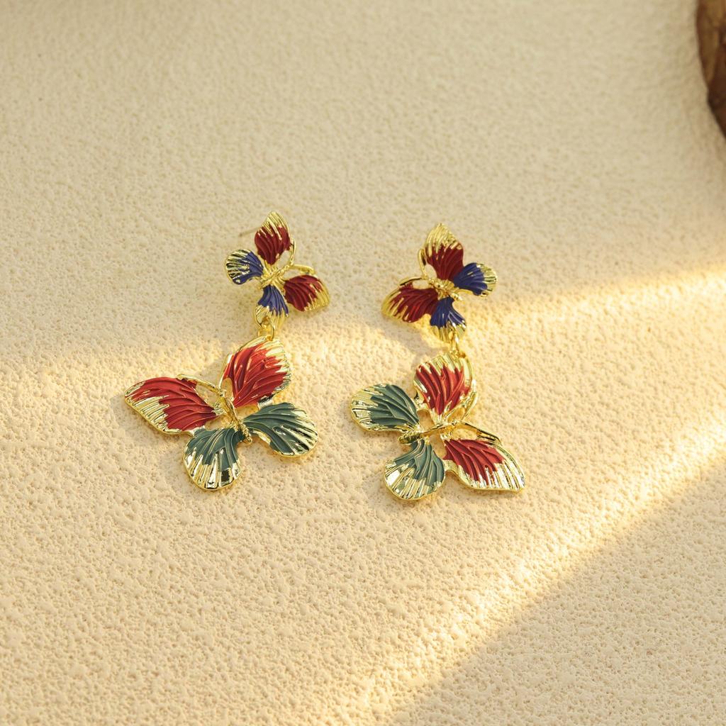 Retro-style double butterfly drop earrings for women elegant ear studs