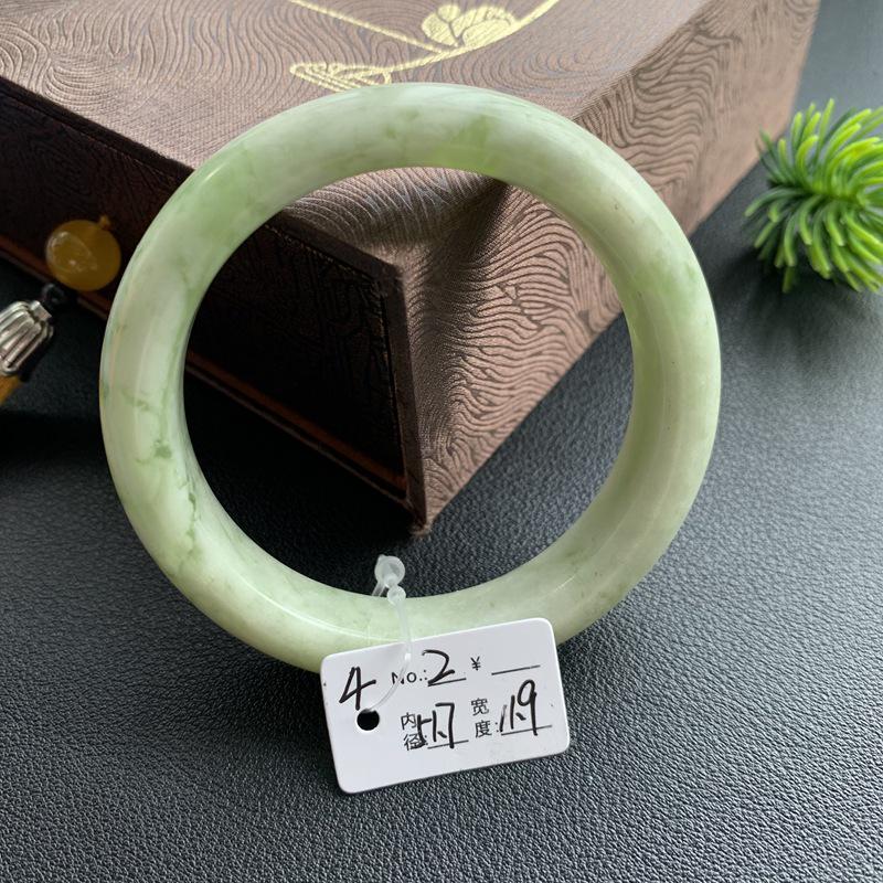 A4 Emerald Green Hetian Jade Bracelet with Floral Design